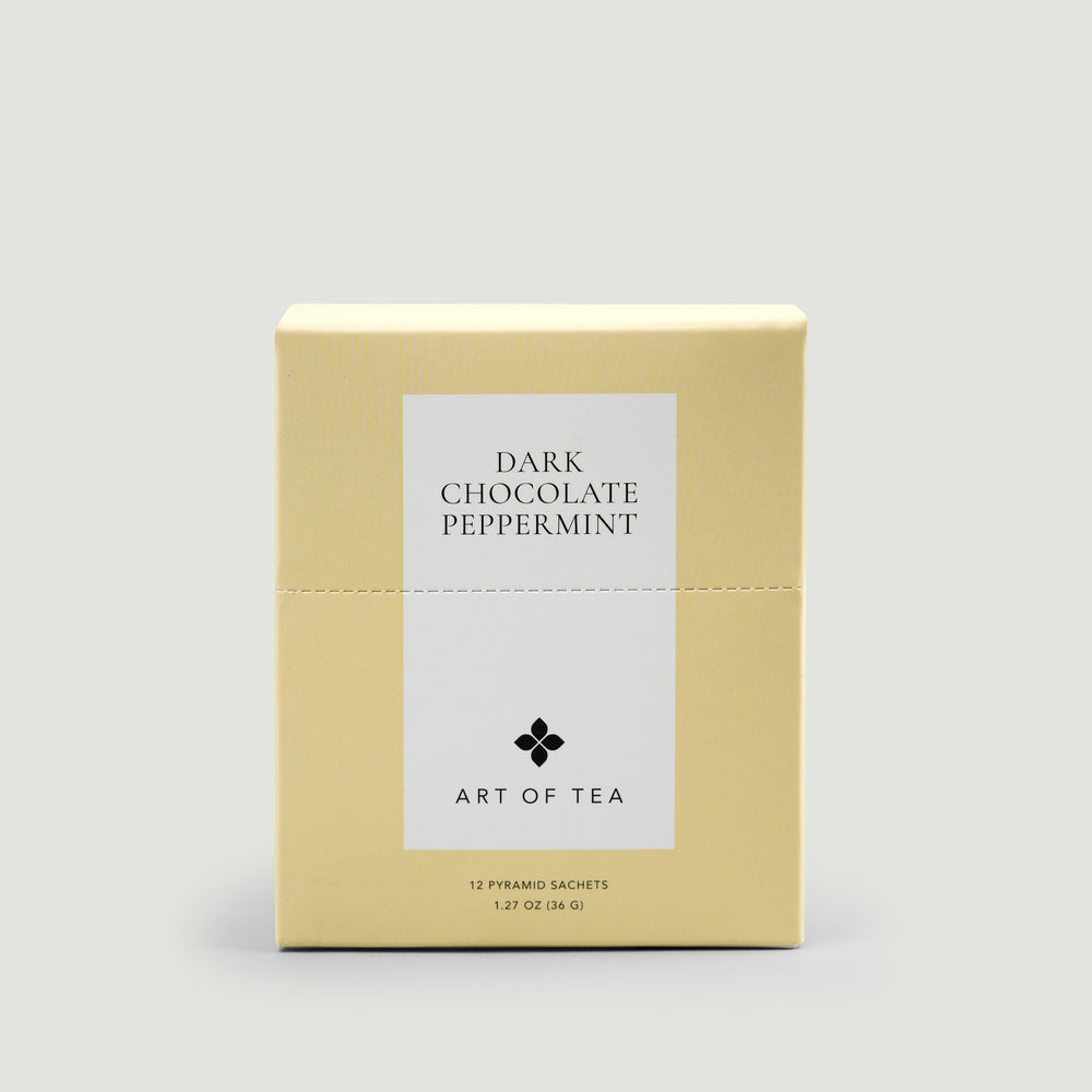 Box of Art of Tea Dark Chocolate Peppermint tea on a light gray background