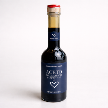 Bottle of Aceto Balsamico on a white background