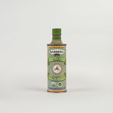 A bottle of Barbera EV OIL ORG CARETTO with a green cap and a label featuring an illustration of olives and a palm tree.