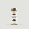 Jar of black truffle carnaroli rice with a white label on a light gray background