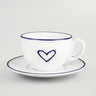A white porcelain cappuccino and tea set with a blue heart design on the cup, consisting of one plate and one cup.