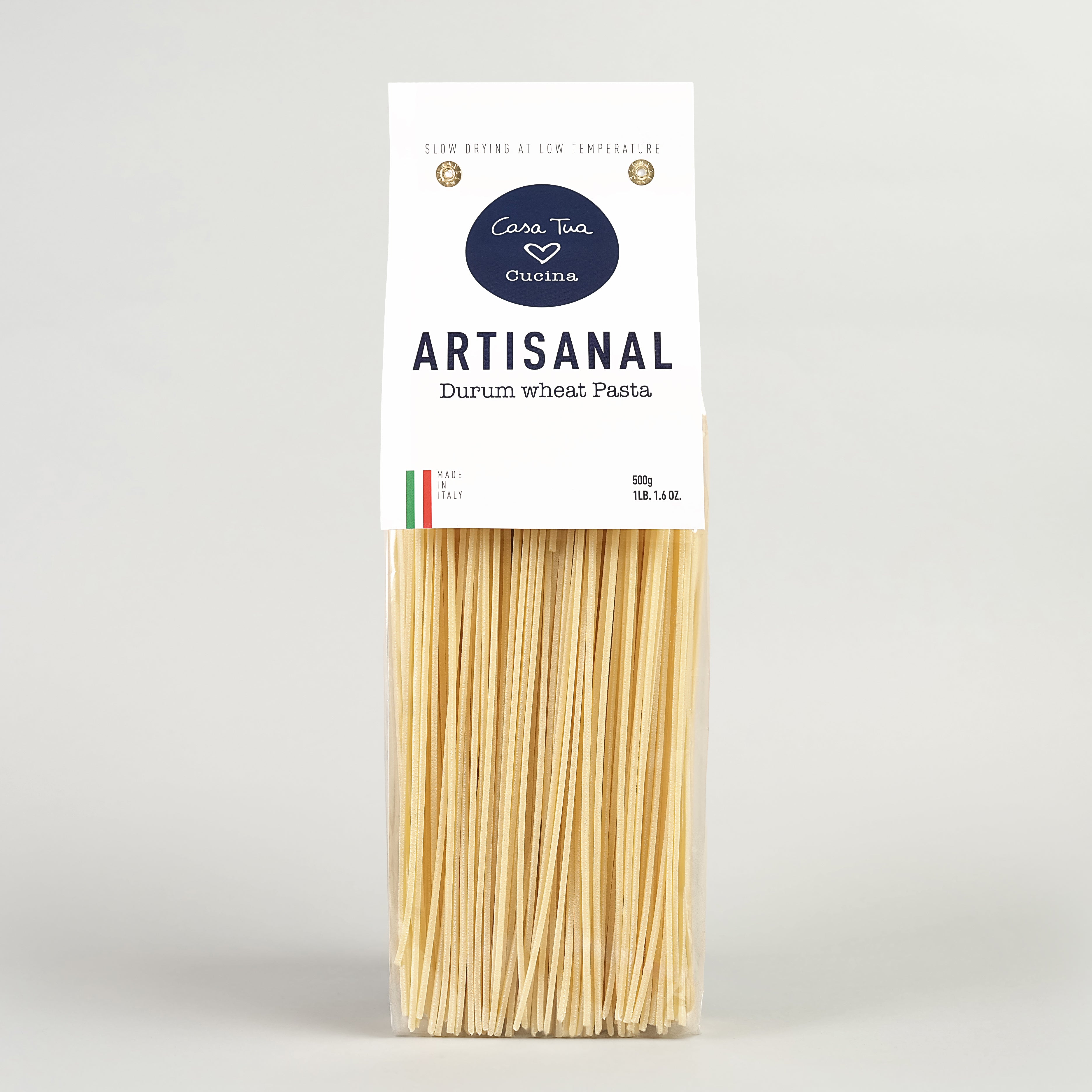A package of artisanal durum wheat pasta spaghetti, 1lb, with branding and product information on the label.
