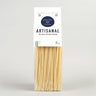 A package of artisanal durum wheat pasta spaghetti, 1lb, with branding and product information on the label.