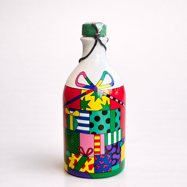Decorative bottle with colorful gift box patterns on a white background