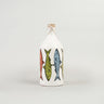A white oil dispenser bottle with a label featuring colorful illustrations of sardines.