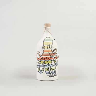 A white water bottle with a colorful octopus design.