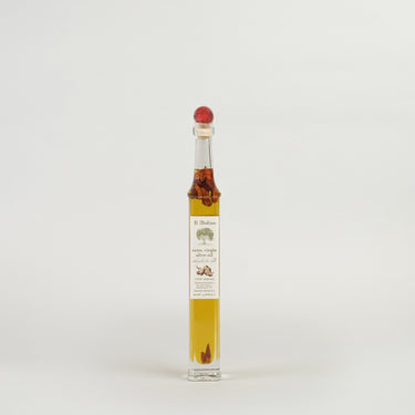 A bottle of MOLINO ORGANIC EVOO GARLIC CHILLI FLAVOURED olive oil with a red cap on a white background.