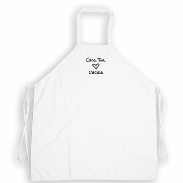 A white kitchen apron with the text 'Casa Tua' and 'Cucina' printed on the front.